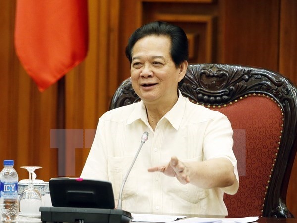 Prime Minister Nguyen Tan Dung urges to ensure macro economy, currency stability - ảnh 1